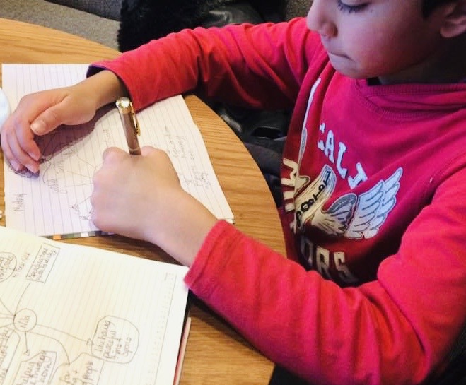 Child writing Child writing